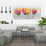 Four Colored Flowers On Gray Background