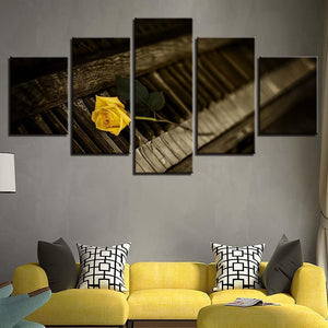 Old Piano With A Yellow Rose